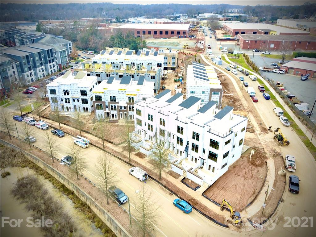 2335 Wesley Village Road, Unit 35 Charlotte, NC 28208 - Photo 2 of 28 a view of building with an outdoor space