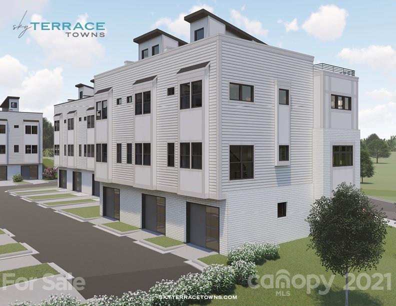 2335 Wesley Village Road, Unit 35 Charlotte, NC 28208 - Photo 17 of 28 a large building with a large windows