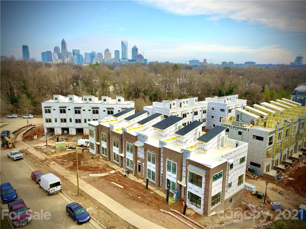 2335 Wesley Village Road, Unit 35 Charlotte, NC 28208 - Photo 3 of 28 a view of a city that has tall buildings