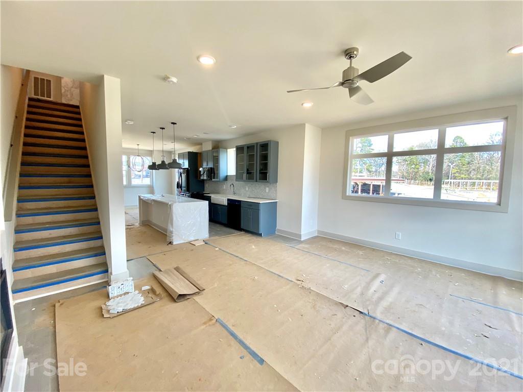 2335 Wesley Village Road, Unit 35 Charlotte, NC 28208 - Photo 22 of 28 a view of a kitchen with furniture and a window