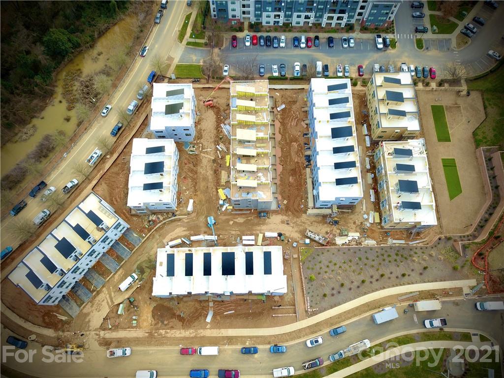 2335 Wesley Village Road, Unit 35 Charlotte, NC 28208 - Photo 4 of 28 a view of a balcony with many windows