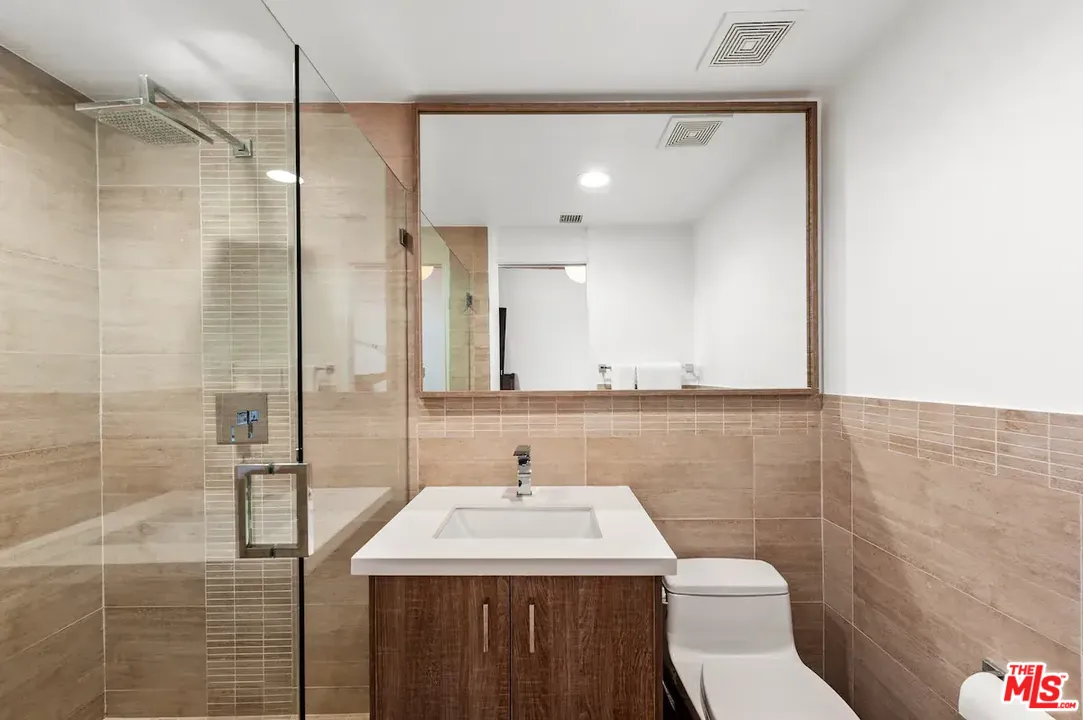 24608 Malibu Road Malibu, CA 90265 - Photo 16 of 30 a bathroom with a sink a toilet and shower