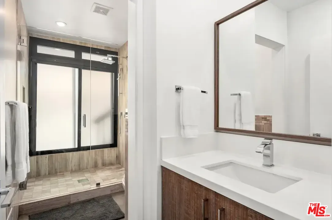 24608 Malibu Road Malibu, CA 90265 - Photo 27 of 30 a bathroom with a sink and a mirror