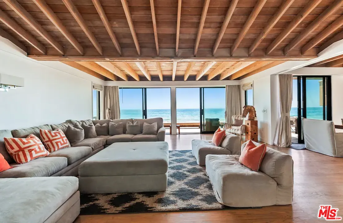 24608 Malibu Road Malibu, CA 90265 - Photo 5 of 30 a living room with furniture and a large window