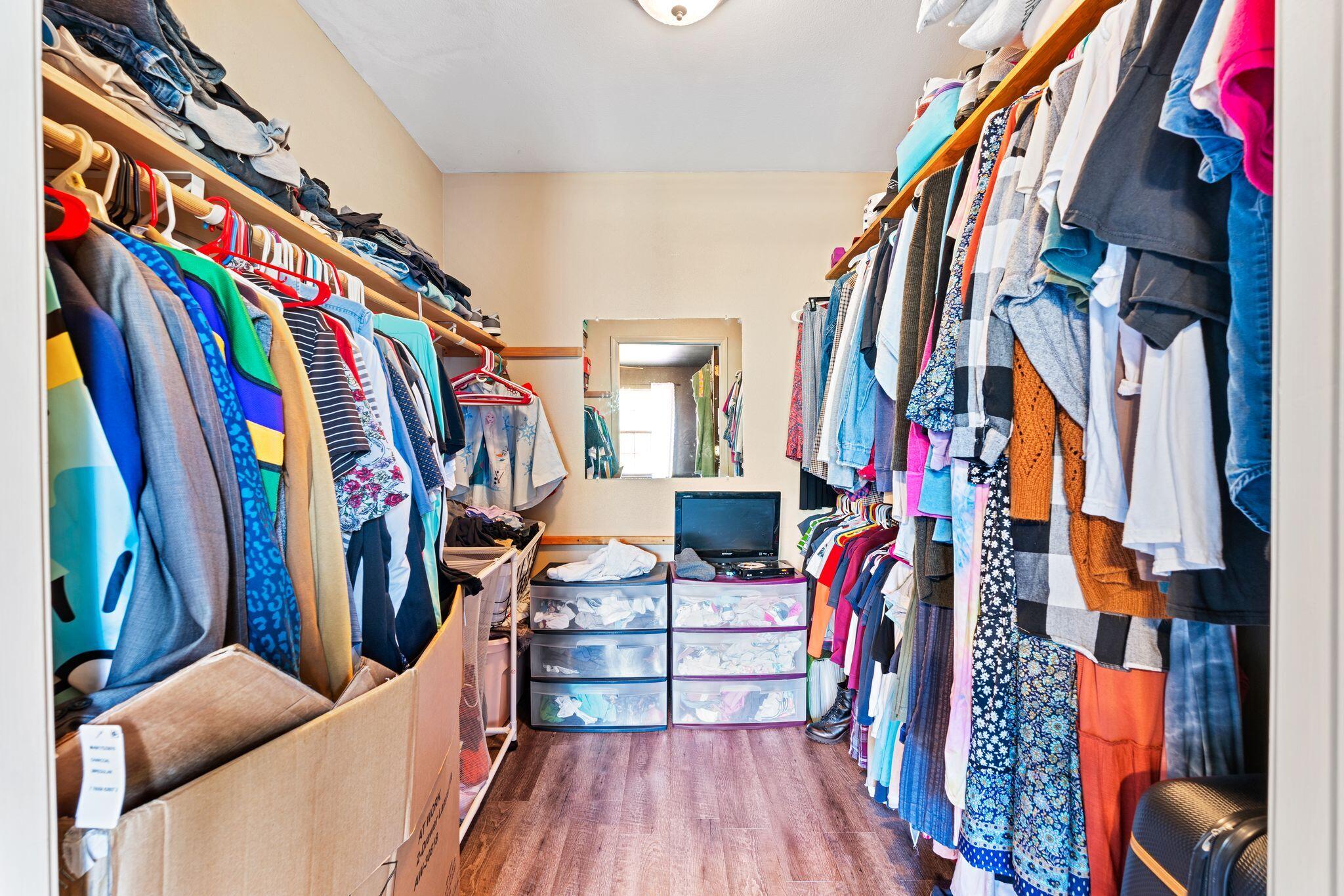 845 Williams Road DeFuniak Springs, FL 32433 - Photo 13 of 24 a view of walk in closet with clothes and shoes
