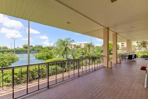 a view of a lake with a yard