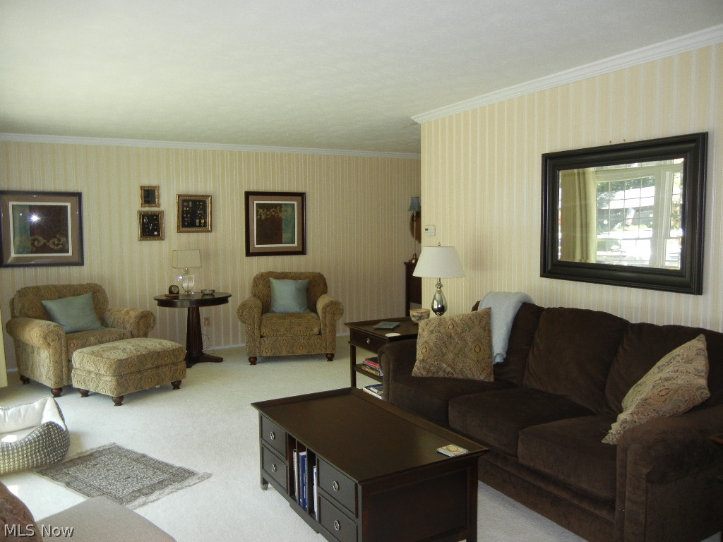 17587 Ridge Creek Road Strongsville, OH 44136 - Photo 4 of 23 Bright and comfortable living room with lovely crown molding!