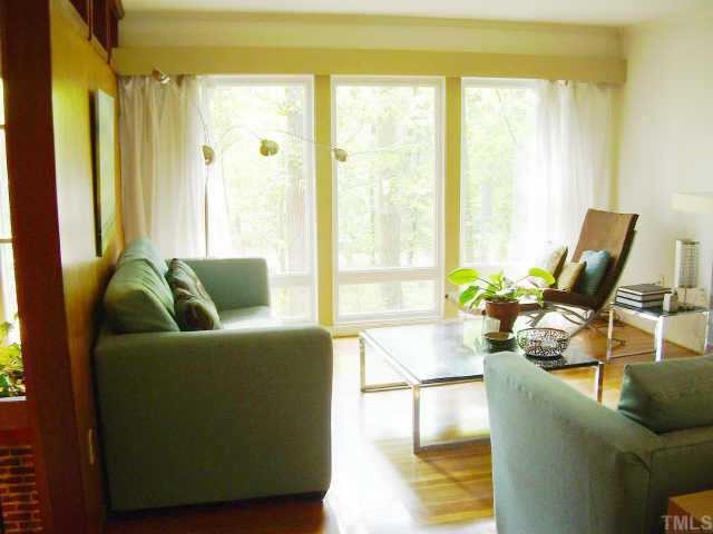 111 Longview Lake Drive Raleigh, NC 27610 - Photo 5 of 10 a living room with furniture and a large window