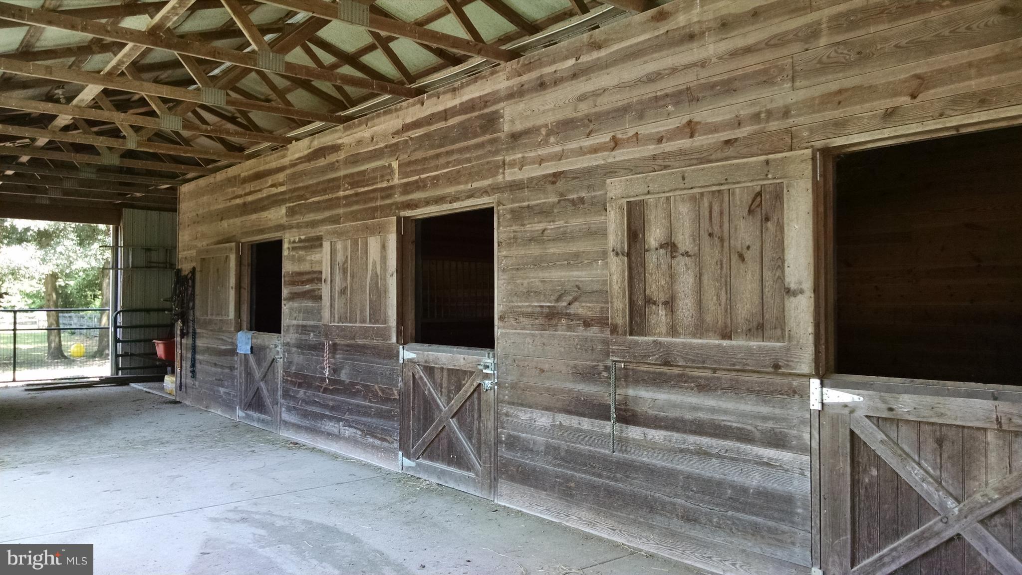5911 Newton Road Preston, MD 21655 - Photo 8 of 30 New barn has 3-12'x12' box stalls and a wash stall