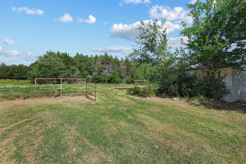 252 Meadow Lake Estates Road Denison, TX 75021 - Photo 26 of 37 Expansive cleared land featuring natural vegetation