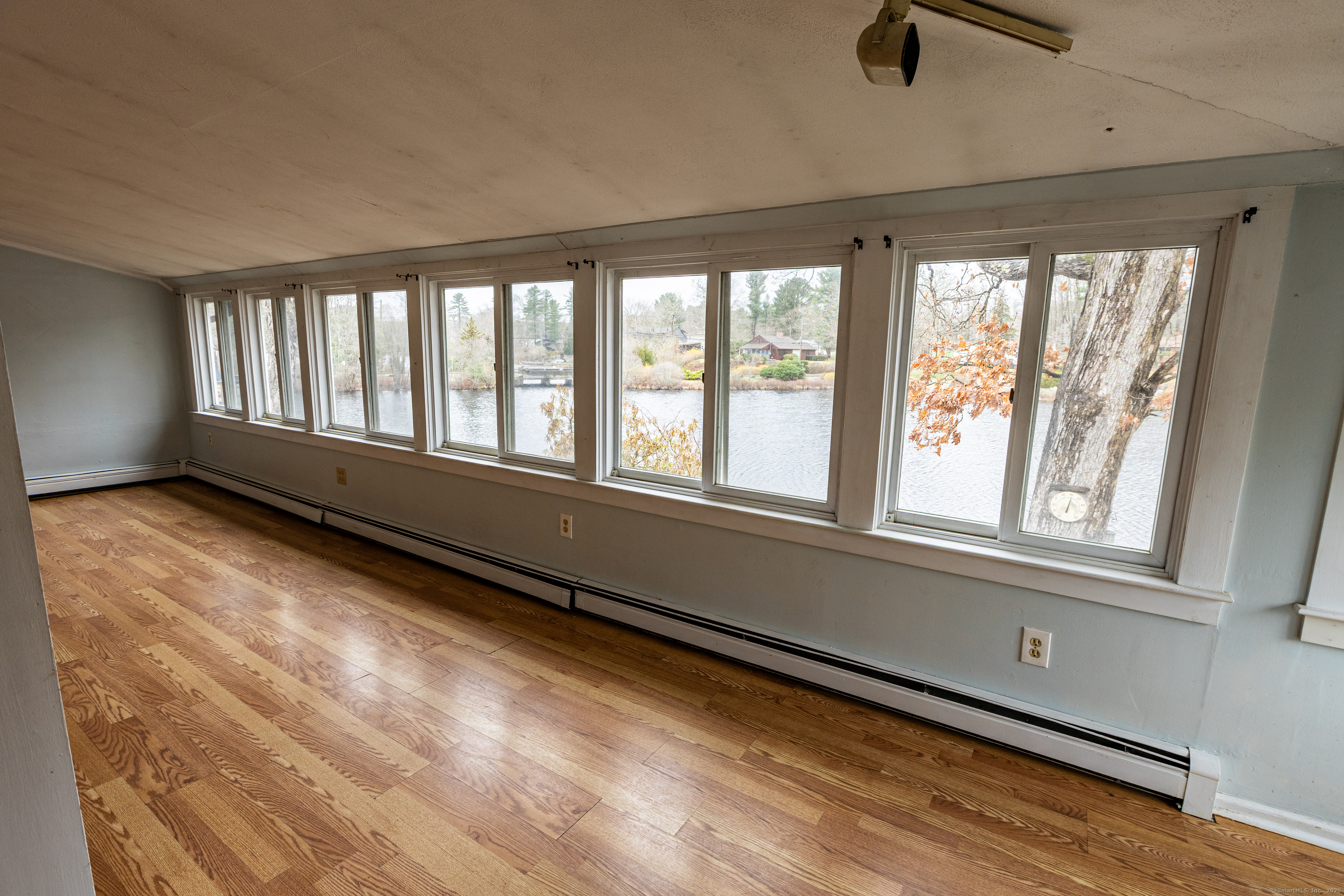 24 Echo Point Road Guilford, CT 06437 - Photo 12 of 30 a view of an empty room with windows