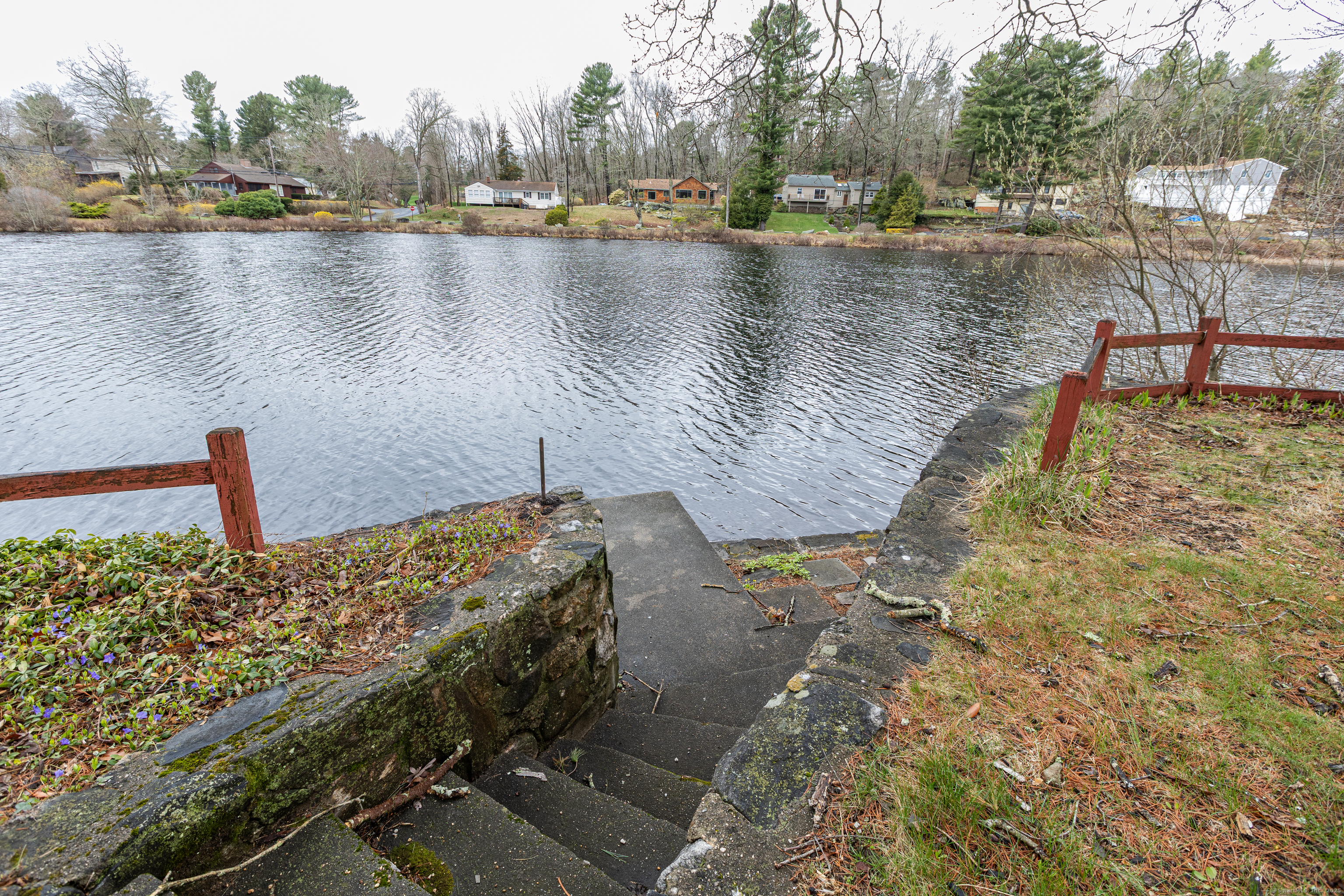 24 Echo Point Road Guilford, CT 06437 - Photo 4 of 30 a view of a lake with houses in the back