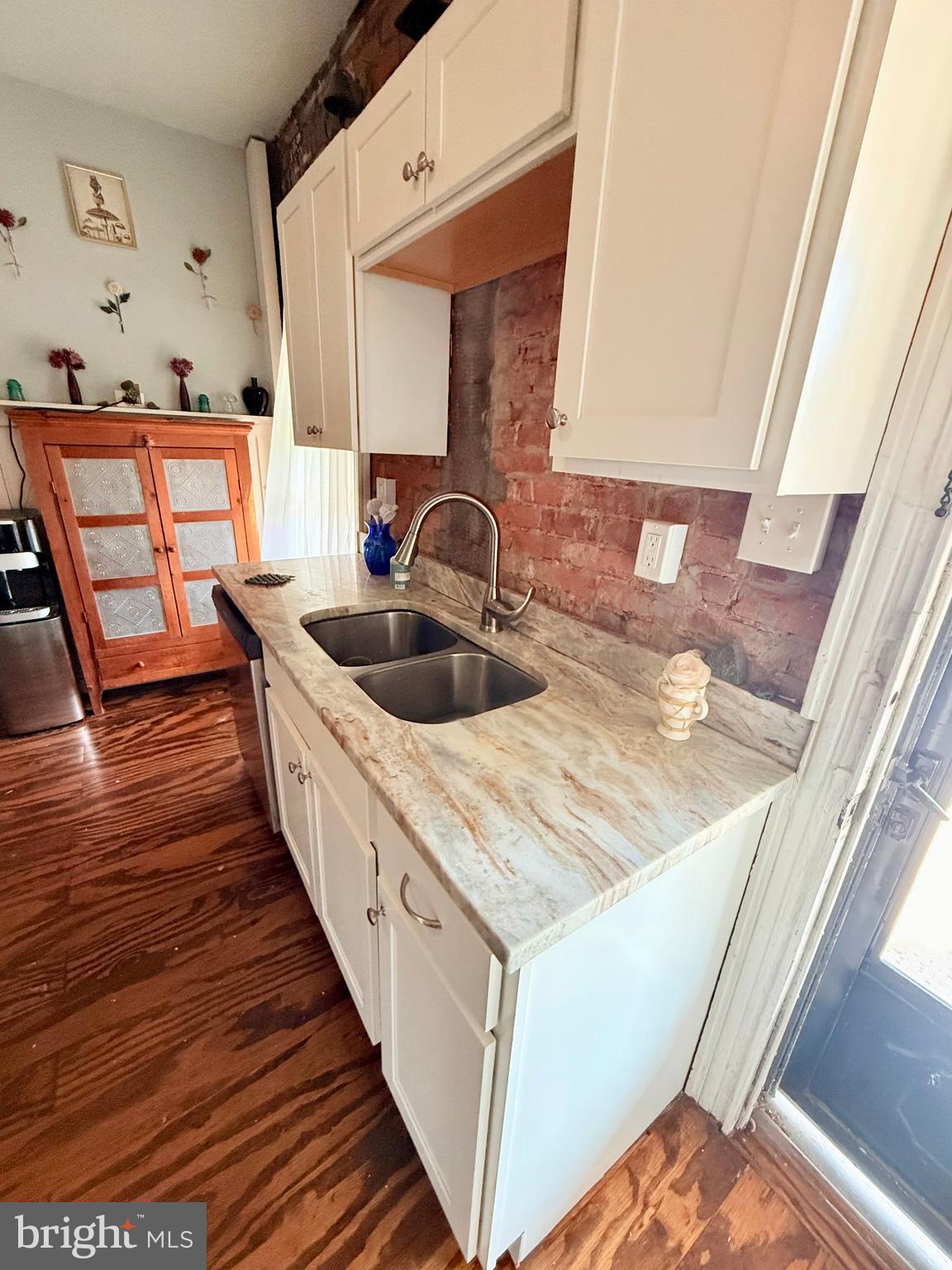 402 West 1st Street Birdsboro, PA 19508 - Photo 11 of 18 a kitchen with sink and wooden floor