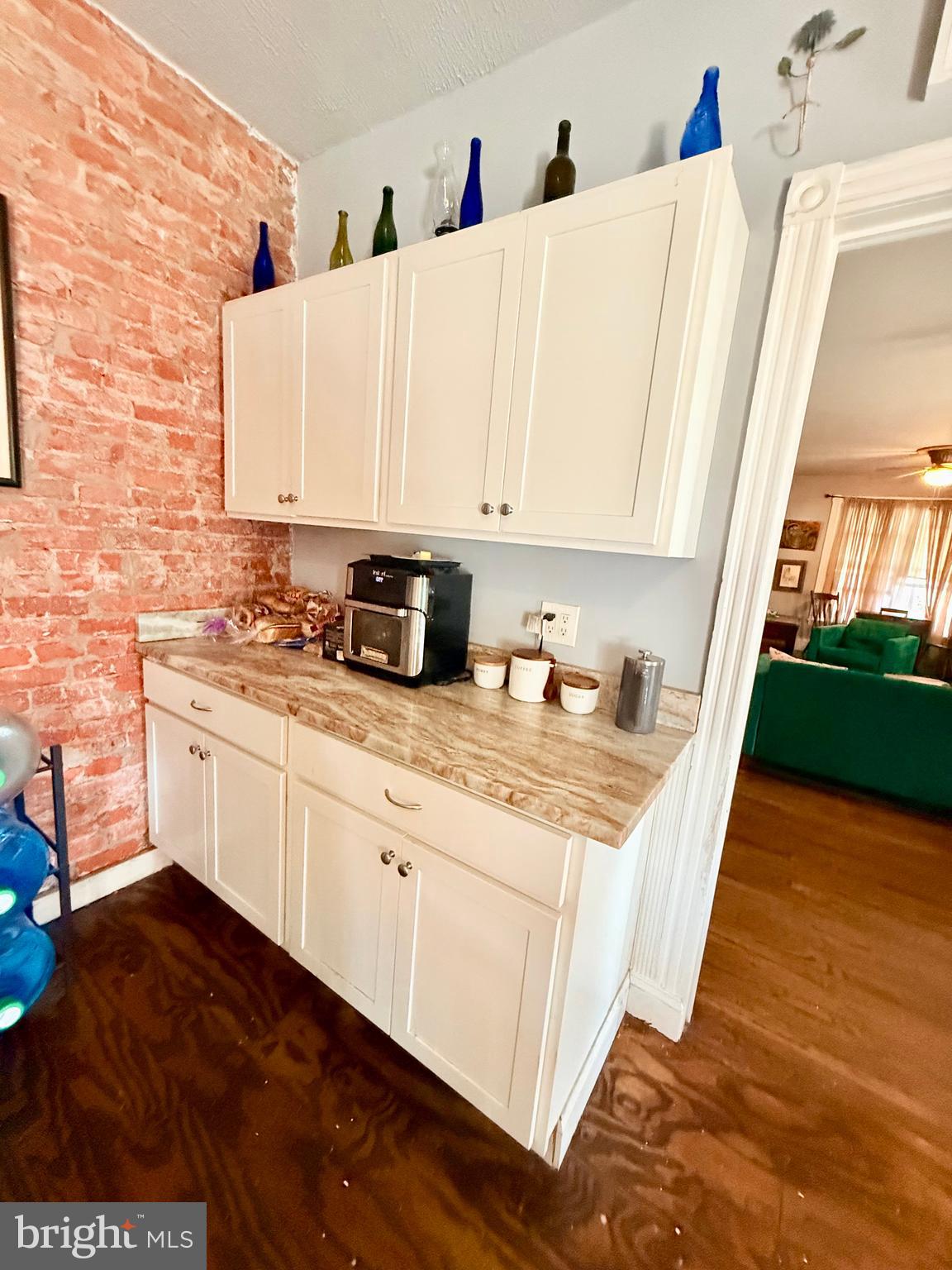 402 West 1st Street Birdsboro, PA 19508 - Photo 12 of 18 a kitchen with granite countertop a sink a stove and cabinets