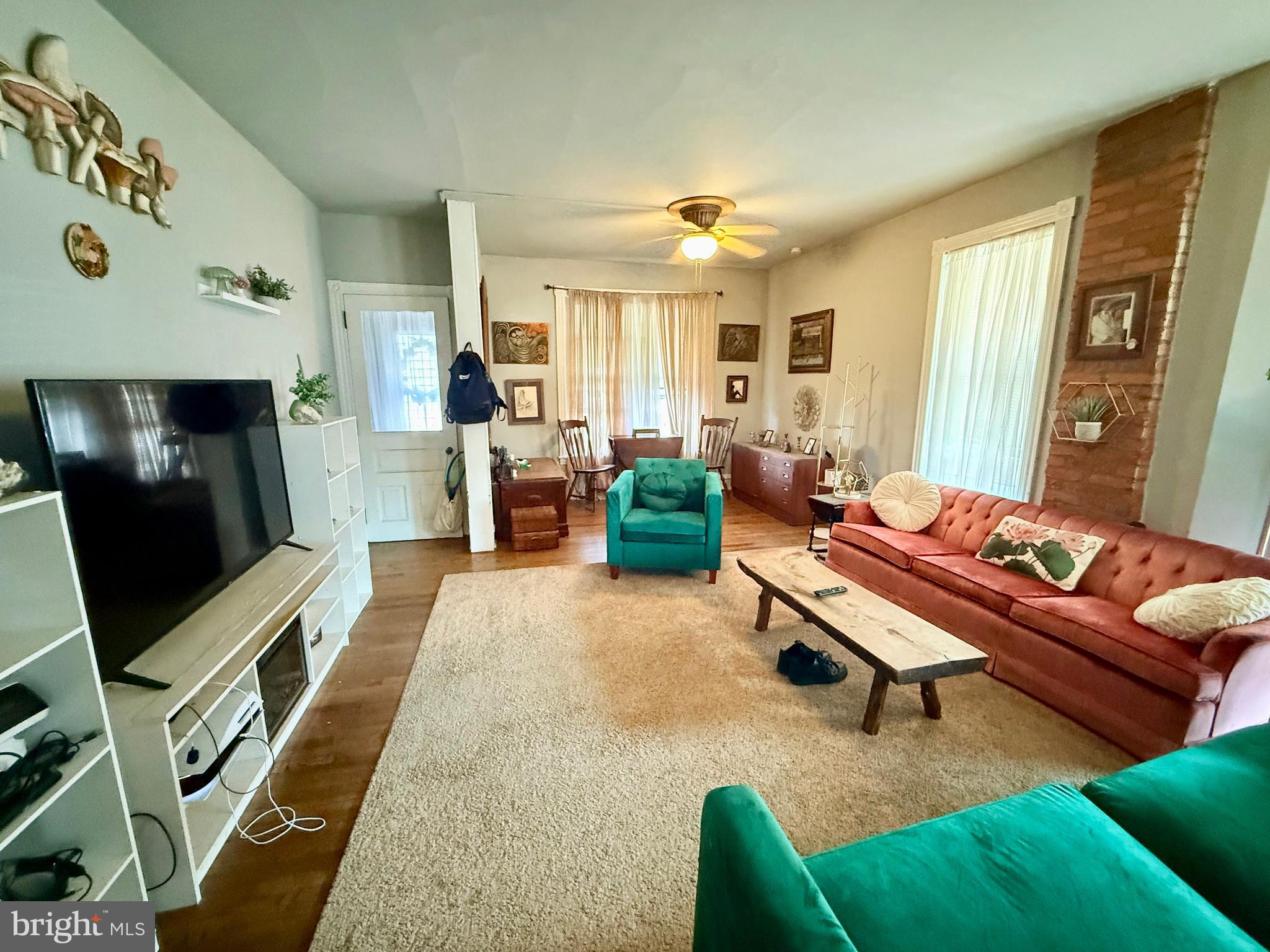 402 West 1st Street Birdsboro, PA 19508 - Photo 5 of 18 a living room with furniture and a flat screen tv