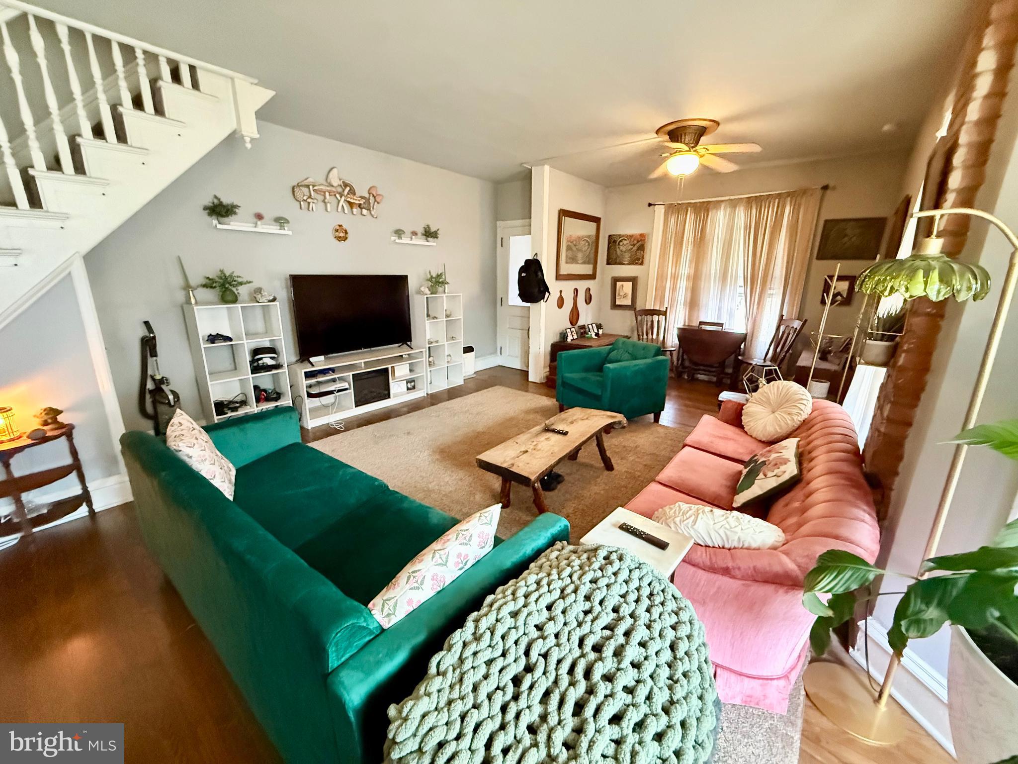 402 West 1st Street Birdsboro, PA 19508 - Photo 6 of 18 a living room with patio furniture and a flat screen tv