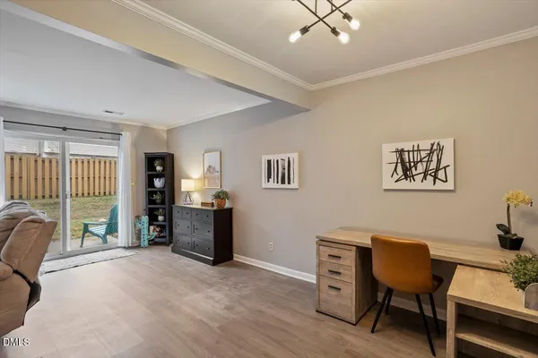 a kitchen with stainless steel appliances a refrigerator a sink and cabinets