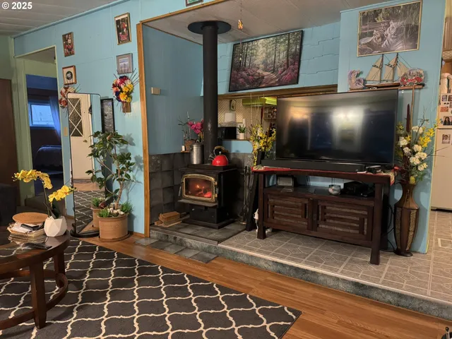 a room with furniture and a flat screen tv