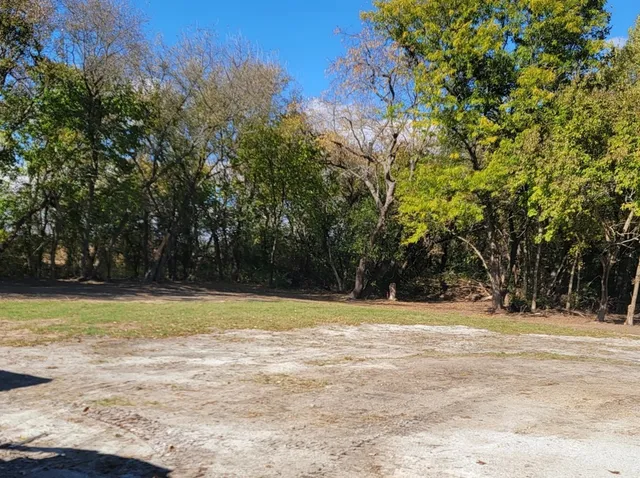 a view of a house with a big yard