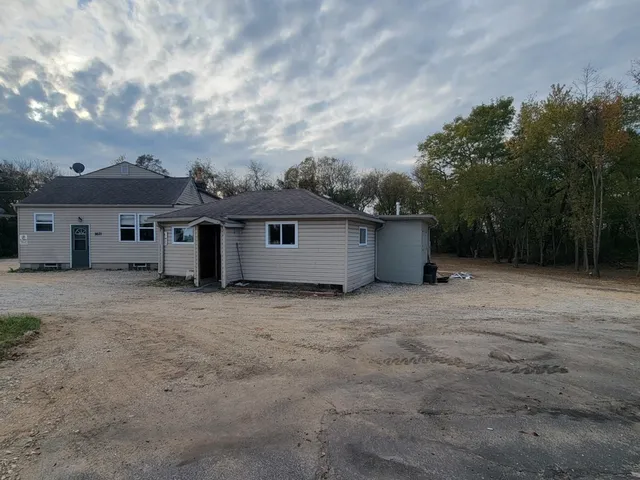 a view of a house with a patio