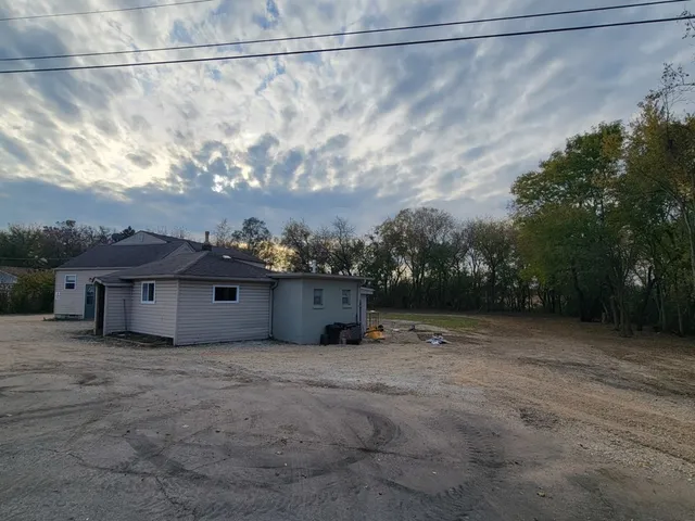 a car parked in front of a house