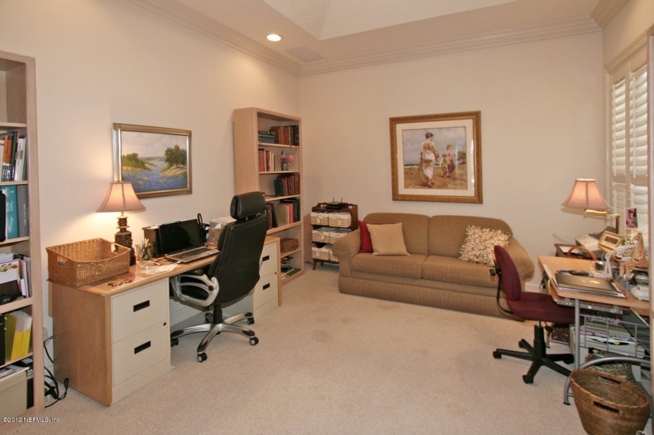 349 Fiddlers Point Drive St. Augustine, FL 32080 - Photo 21 of 27 a view of a livingroom with workspace and a couch