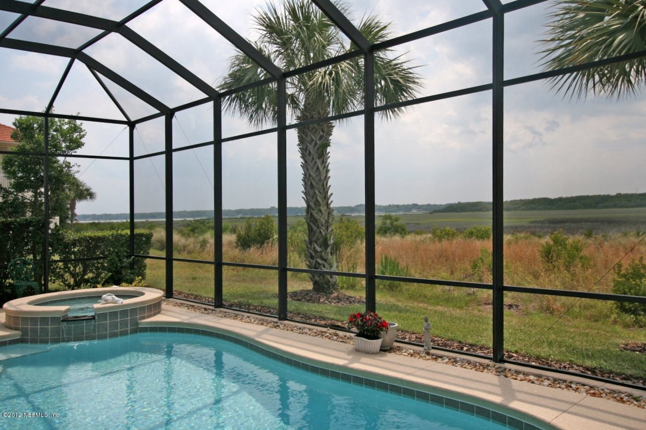 349 Fiddlers Point Drive St. Augustine, FL 32080 - Photo 25 of 27 a view of swimming pool with outdoor seating