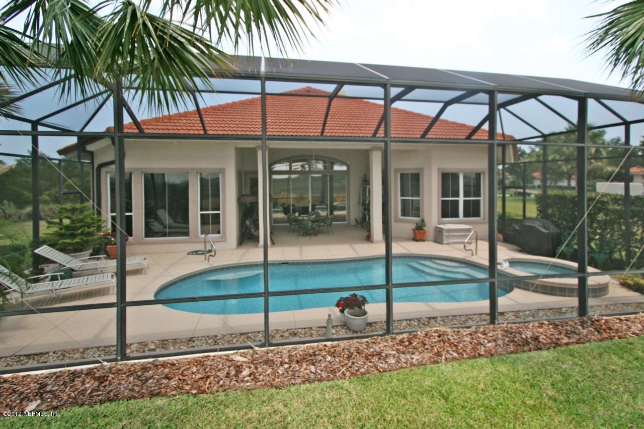 349 Fiddlers Point Drive St. Augustine, FL 32080 - Photo 5 of 27 a view of a house with a yard