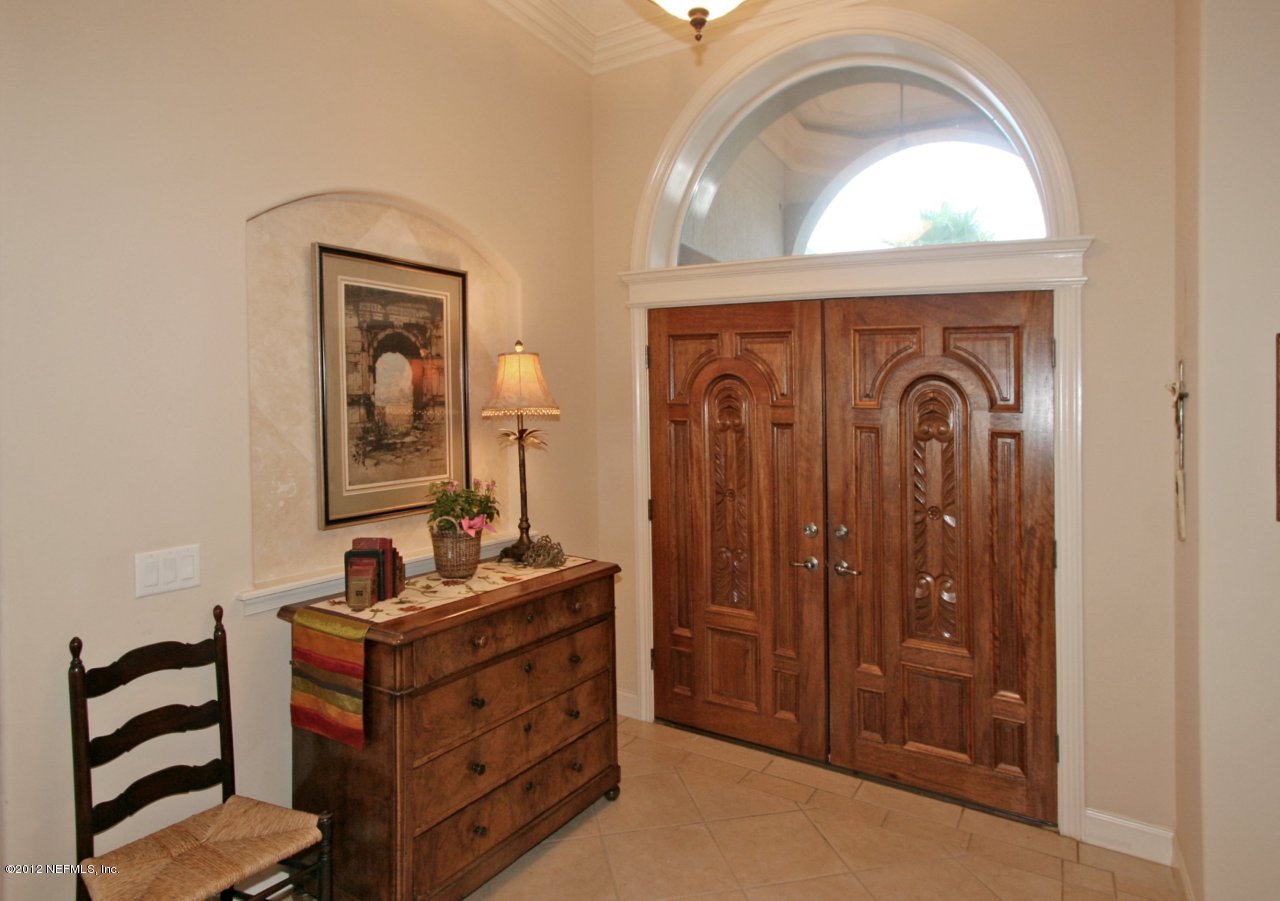 349 Fiddlers Point Drive St. Augustine, FL 32080 - Photo 8 of 27 a front view of a house with mirror