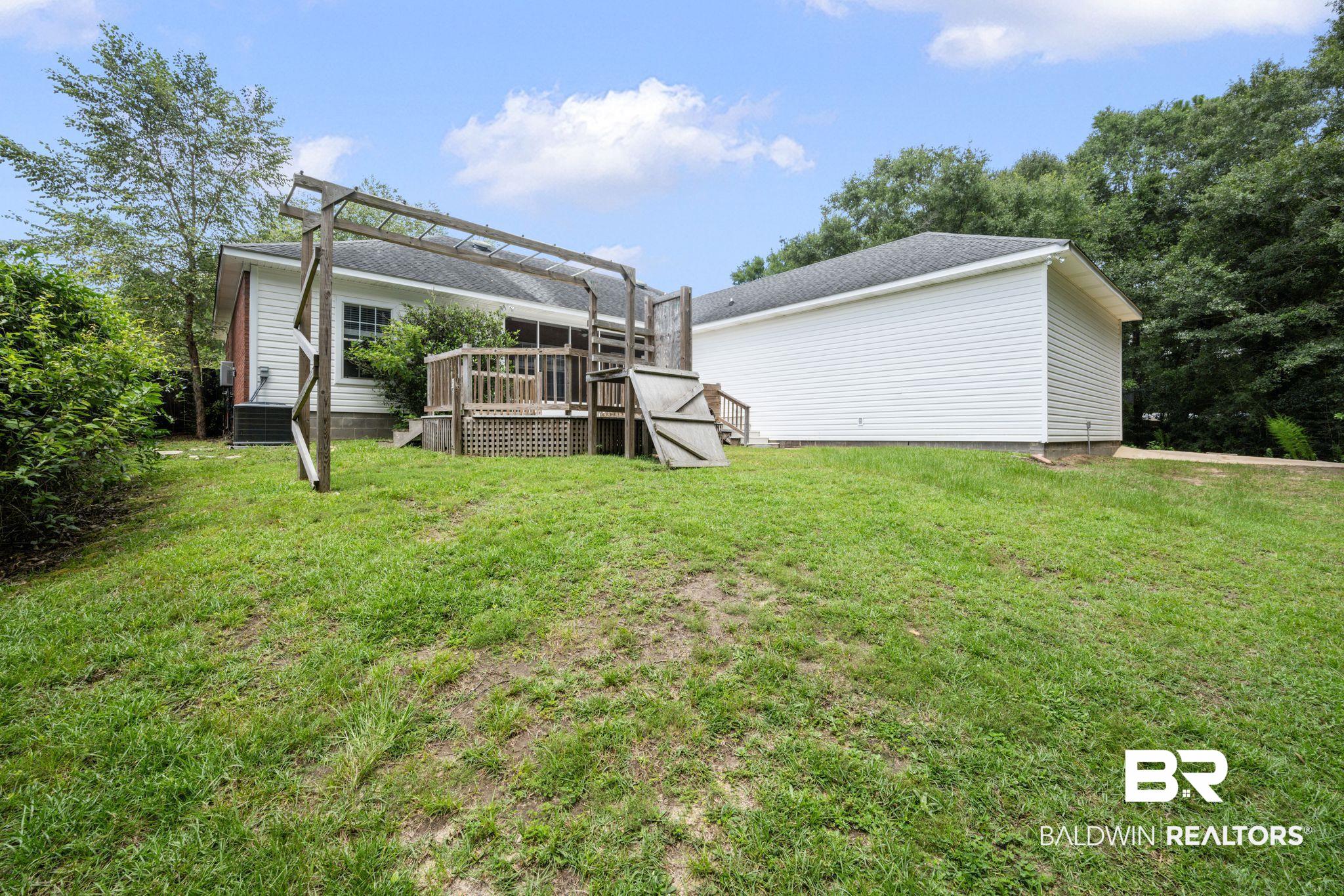 2041 Ridgeline Drive Mobile, AL 36695 - Photo 39 of 43 View of yard with a deck