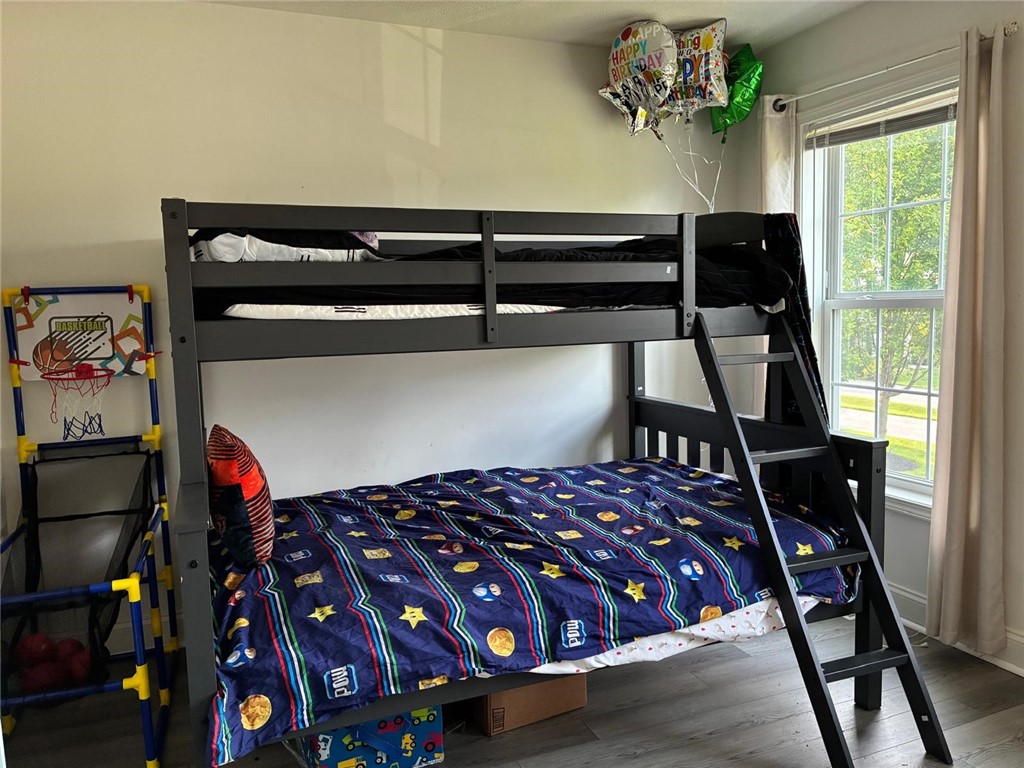 18 Dona Lea Road Perinton, NY 14450 - Photo 21 of 29 One of three bedrooms with lots of light and storage space.