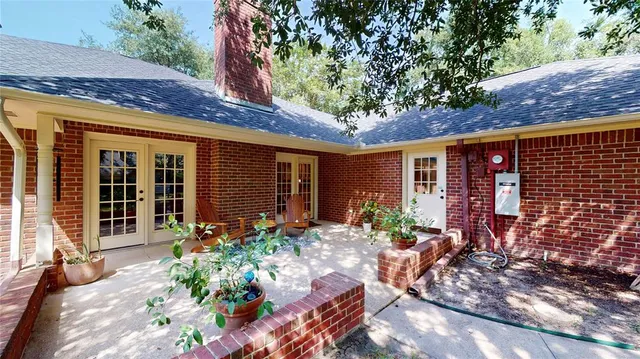 a view of house with patio