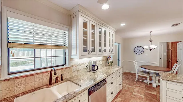 a very nice looking rest room with a large window