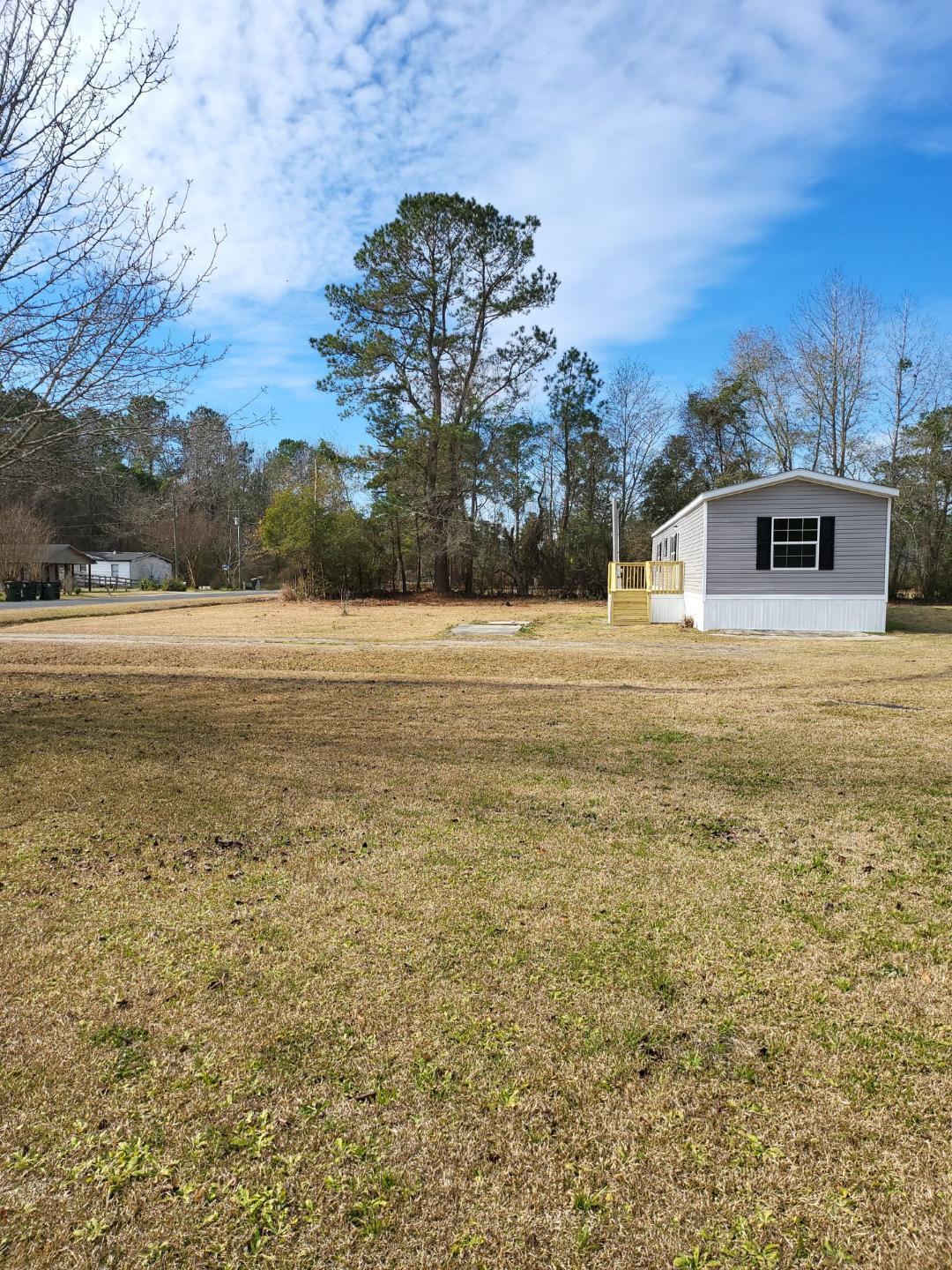 1178 Hard Pinch Road Moncks Corner, SC 29461 - Photo 2 of 11 1178 Side yard to road