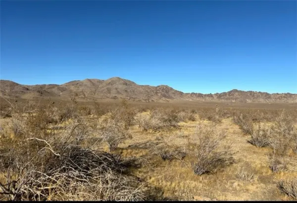 a view of mountains and valleys