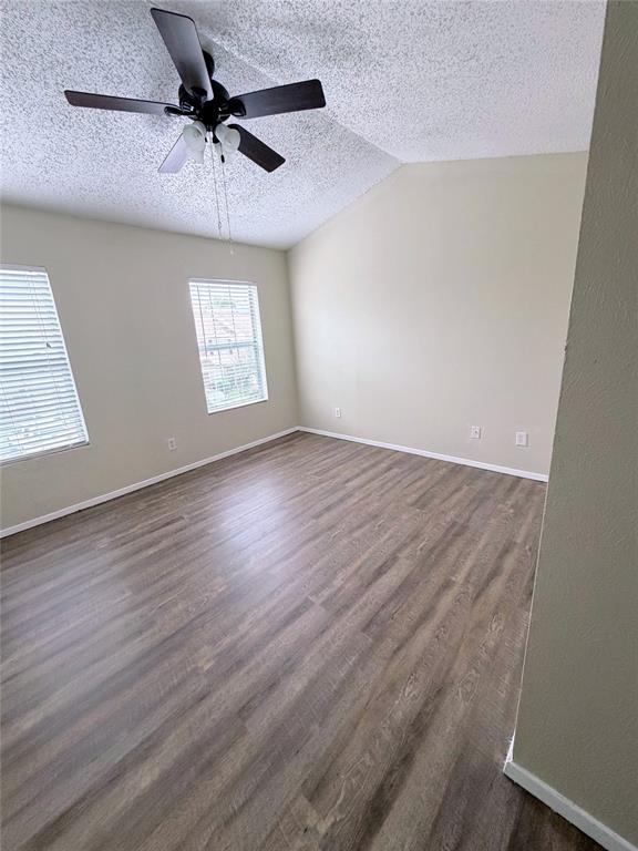10500 Lake June Road, Unit M07 Dallas, TX 75217 - Photo 11 of 14 wooden floor in an empty room with a window