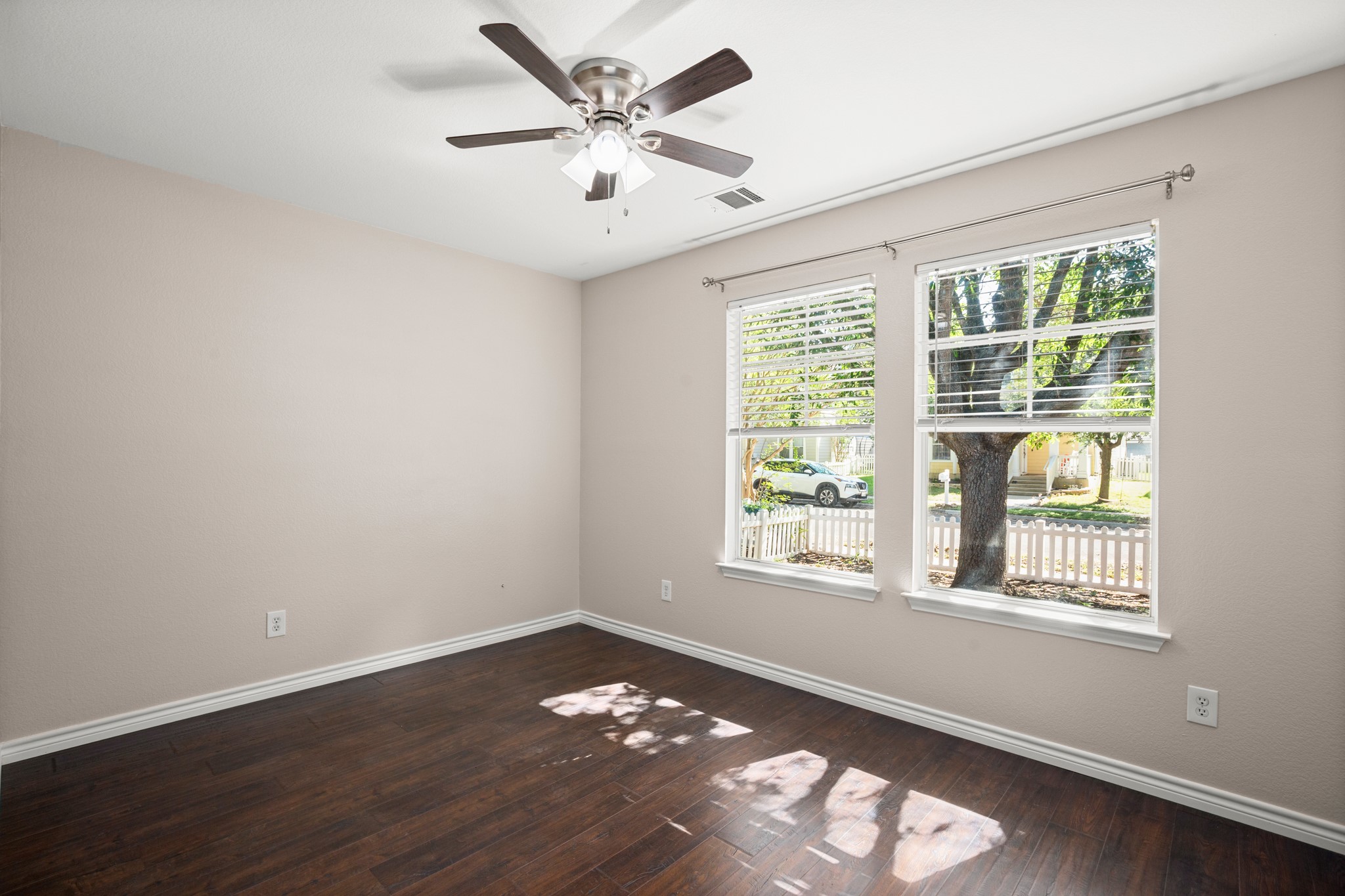 151 Sampson Kyle, TX 78640 - Photo 19 of 23 Soft light, tall ceilings, dark floors, and zero chaos.