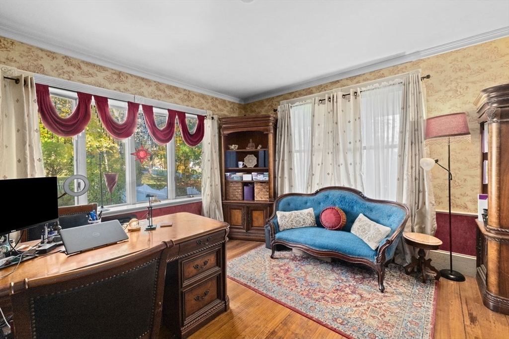 17 Old Oaken Bucket Road Scituate, MA 02066 - Photo 24 of 41 a living room with furniture and a flat screen tv