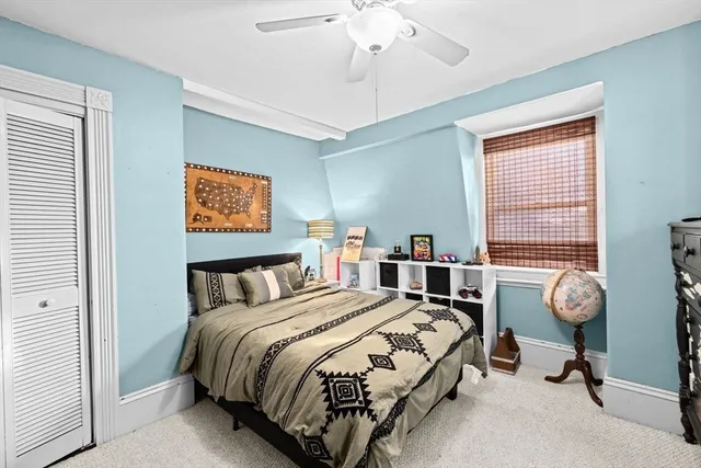 a bathroom with a double vanity sink a two mirror and a bathtub