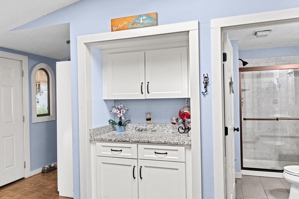 17 Old Oaken Bucket Road Scituate, MA 02066 - Photo 8 of 41 a kitchen with a refrigerator sink and cabinets