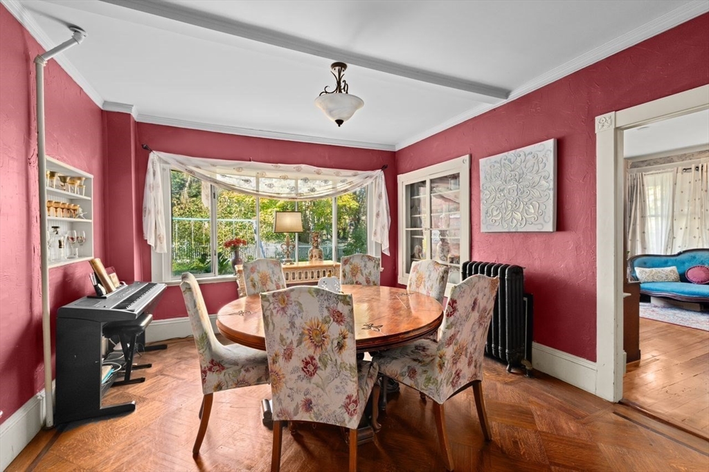 17 Old Oaken Bucket Road Scituate, MA 02066 - Photo 10 of 41 a view of a dining room with furniture window and wooden floor