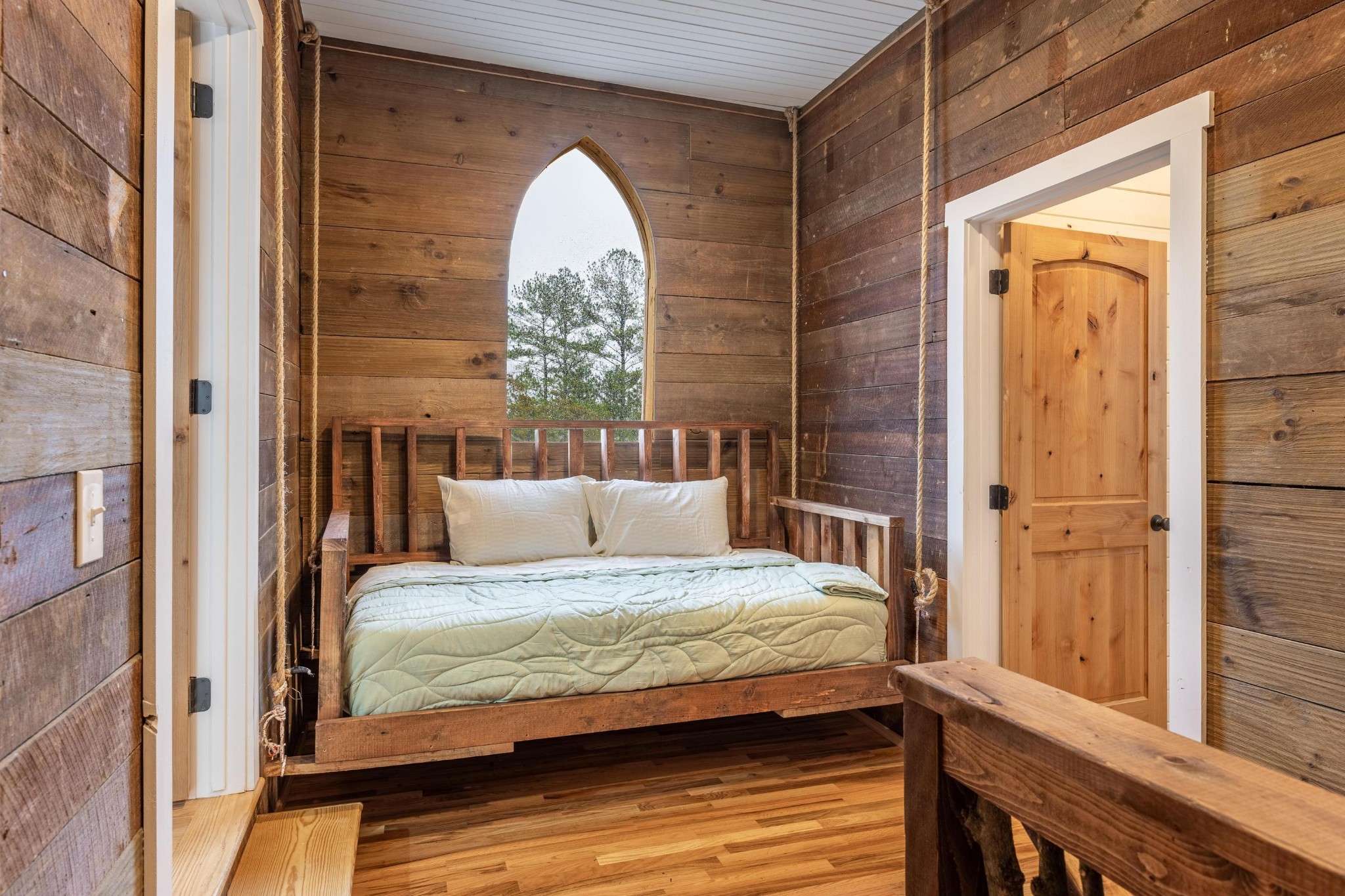 205 Us Highway Rising Fawn, GA 30738 - Photo 15 of 62 a bedroom with a bed and a window