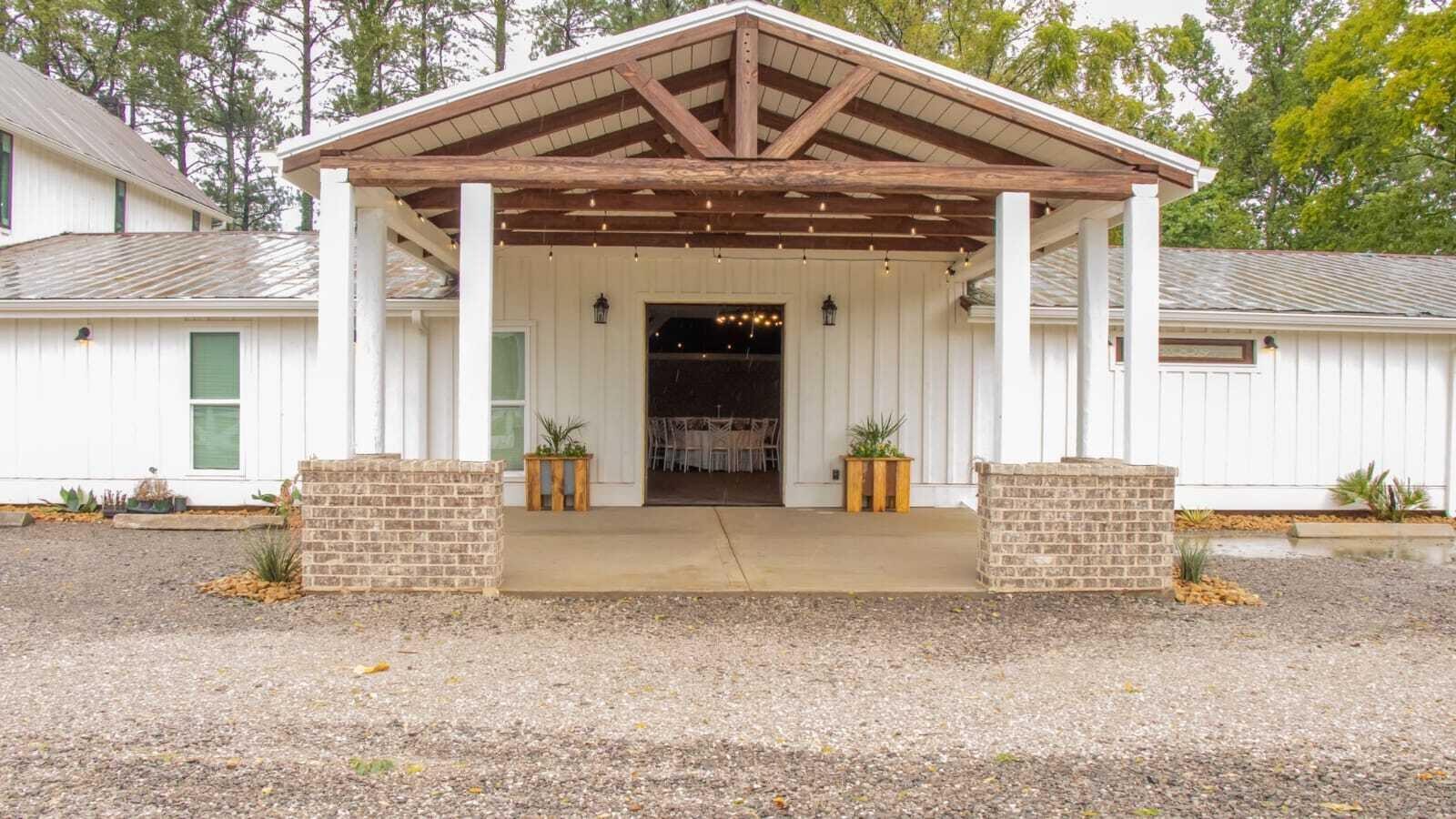 205 Us Highway Rising Fawn, GA 30738 - Photo 2 of 62 a front view of a house with basket ball court and glass windows