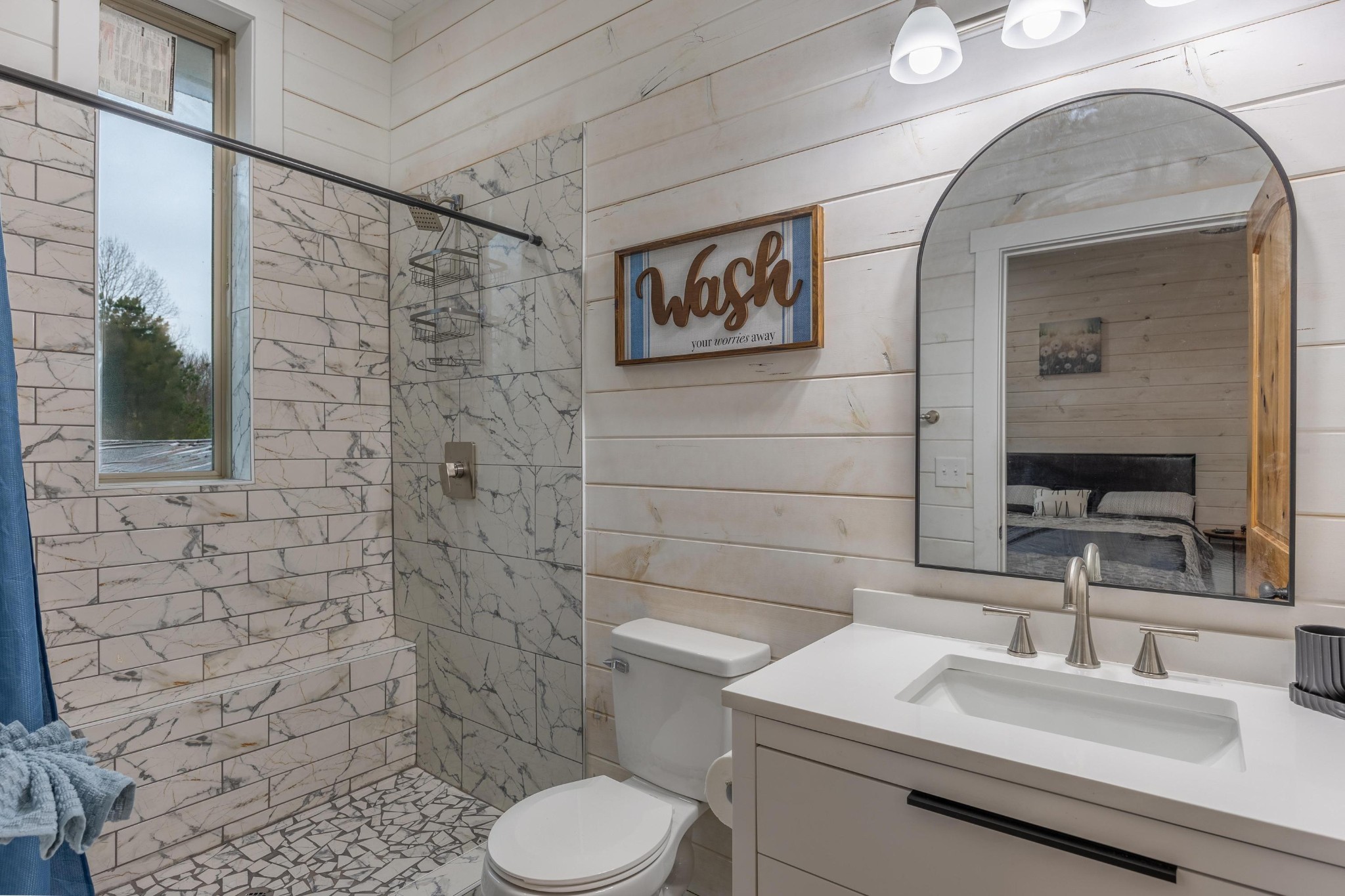 205 Us Highway Rising Fawn, GA 30738 - Photo 26 of 62 a bathroom with a sink a toilet and mirror