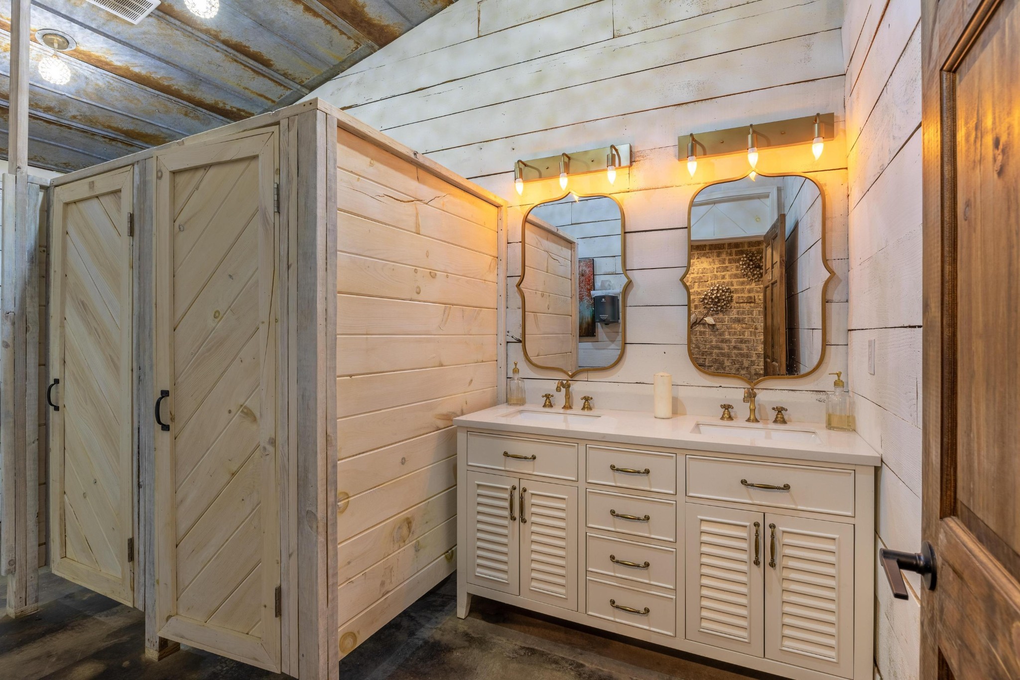 205 Us Highway Rising Fawn, GA 30738 - Photo 33 of 62 a bathroom with a double vanity sink and mirror