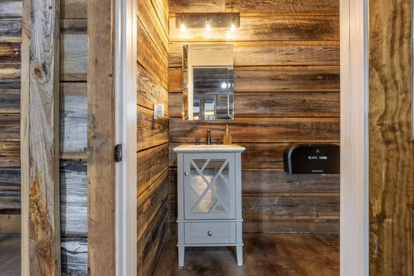 a view of a room with lots of table chair