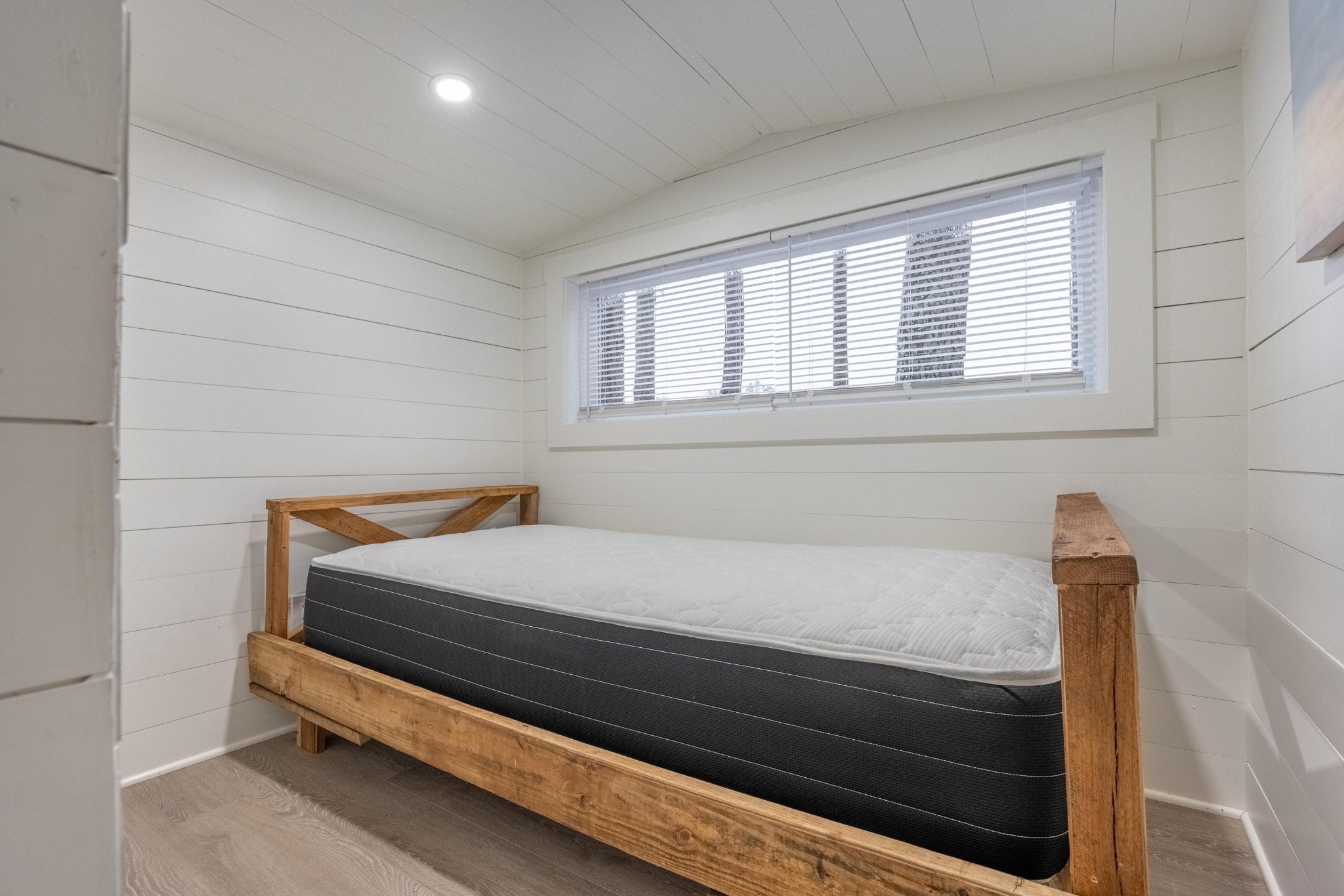 205 Us Highway Rising Fawn, GA 30738 - Photo 54 of 62 a bed sitting in a bedroom next to a window