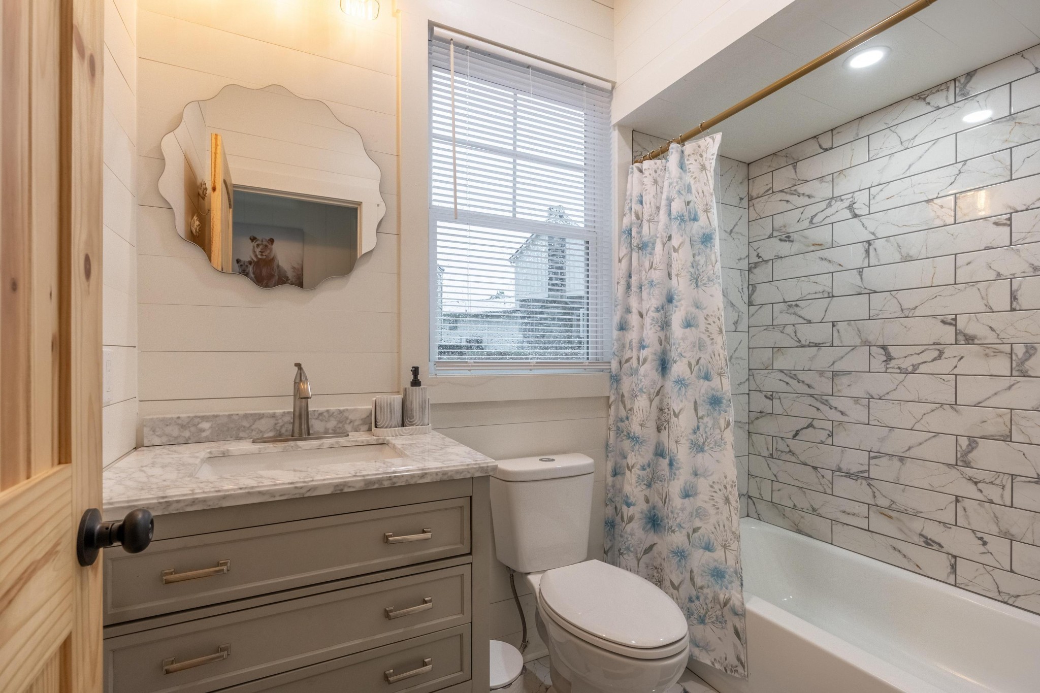 205 Us Highway Rising Fawn, GA 30738 - Photo 55 of 62 a bathroom with a granite countertop sink toilet a mirror and shower