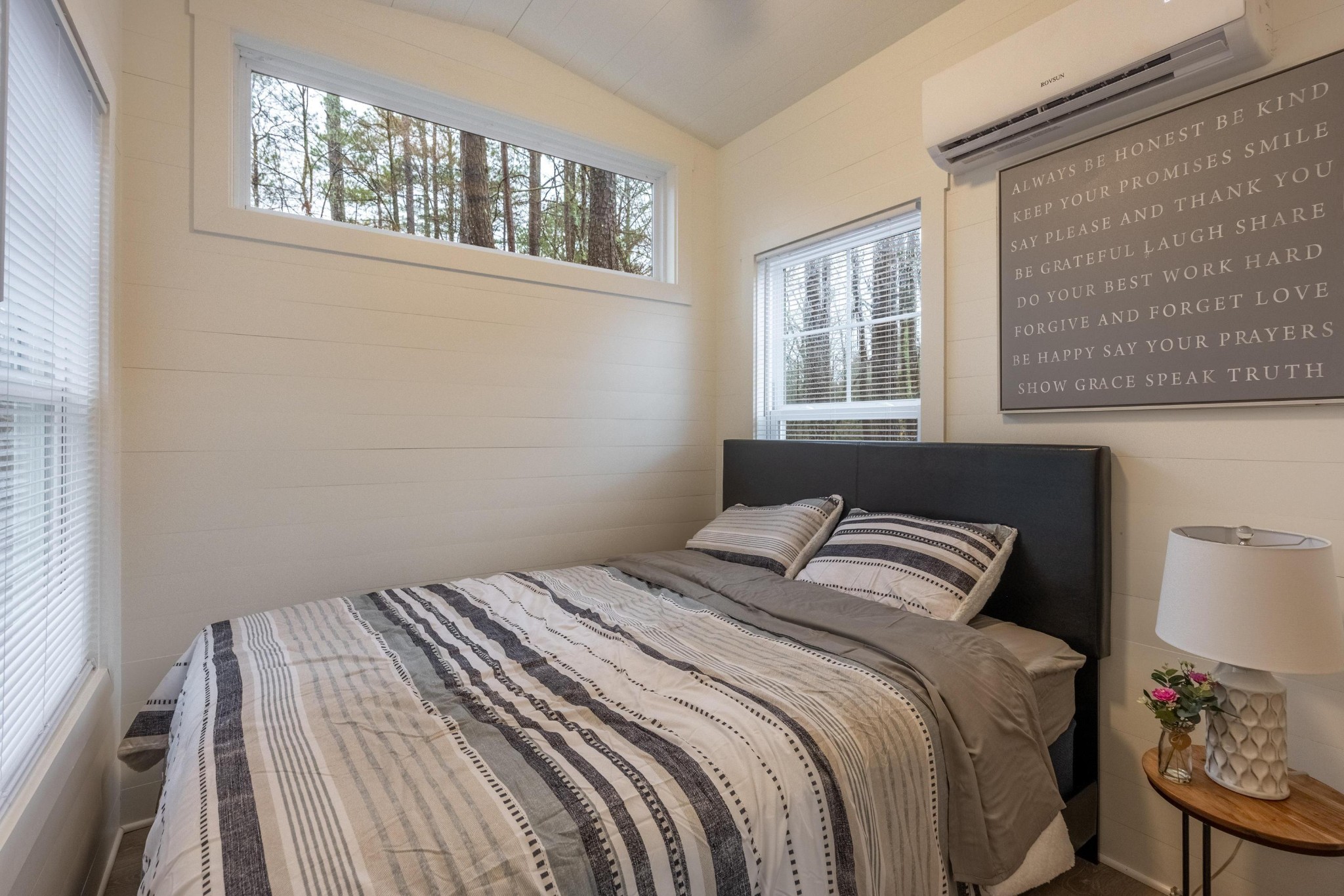 205 Us Highway Rising Fawn, GA 30738 - Photo 56 of 62 a bedroom with a bed and a window with chair