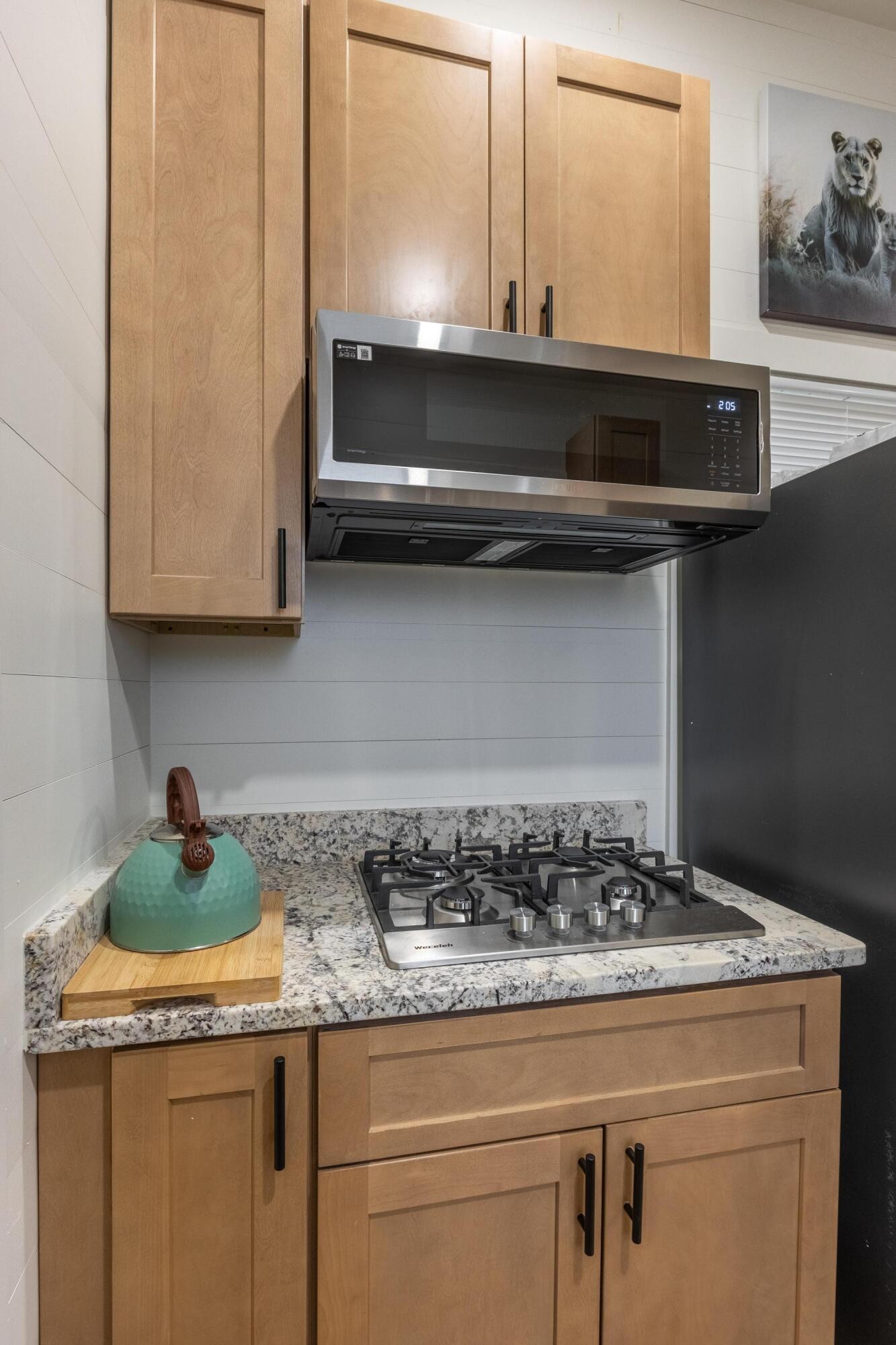 205 Us Highway Rising Fawn, GA 30738 - Photo 61 of 62 a kitchen with granite countertop a sink and cabinets